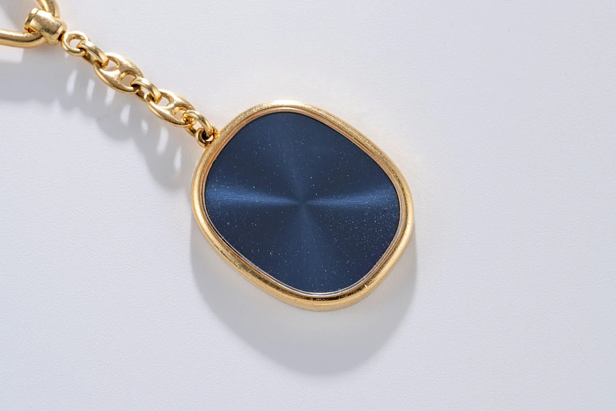 Ellipse Cuff Links and Keychain in 18k Yellow Gold