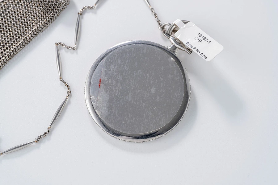 Platinum Pocketwatch diamond-set 1912 with platinum Cartier purse