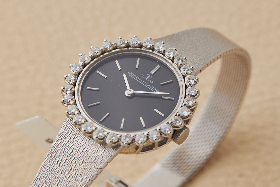 18-Carat white-gold dress JLC with diamonds setting