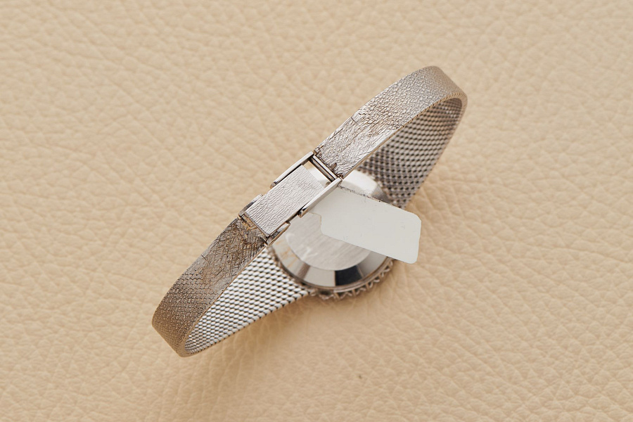 18-Carat white-gold dress JLC with diamonds setting