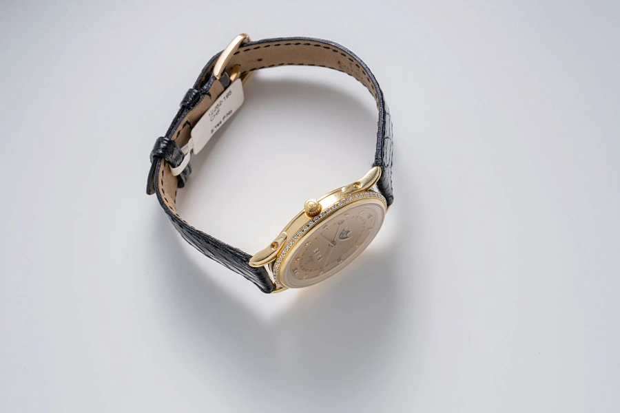 Triple Calendar Ref. 156003 in 18k Yellow Gold with Diamond Bezel