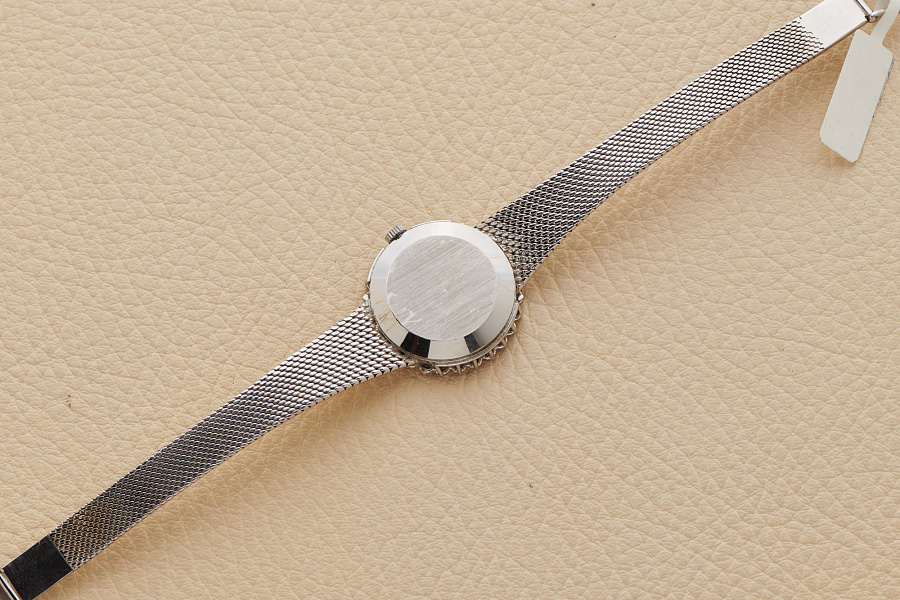 18-Carat white-gold dress JLC with diamonds setting