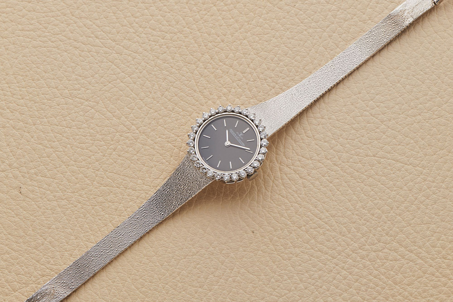 18-Carat white-gold dress JLC with diamonds setting