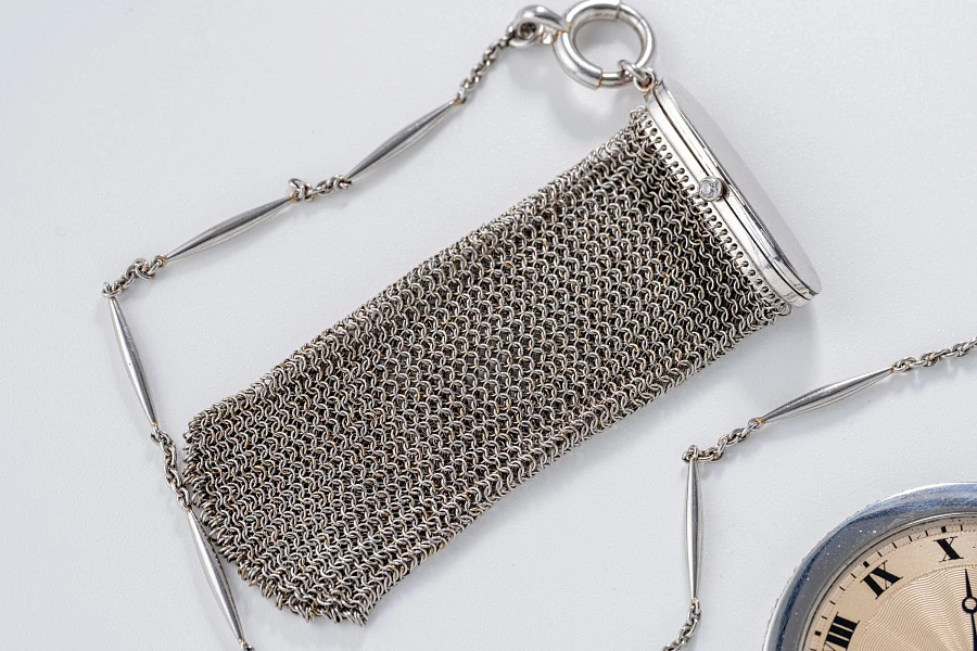 Platinum Pocketwatch diamond-set 1912 with platinum Cartier purse